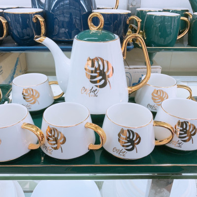 BỘ BÌNH TRÀ KÈM KHAY SỨ CÁO CẤP MÀU XANH CỔ VỊT KẾT HỢP TRẮNG HỌA TIẾT LÁ VÀNG CAO CẤP - ANTH280