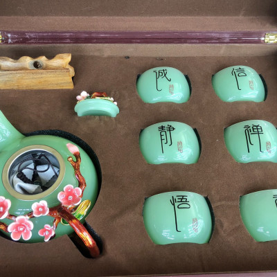 Bộ ấm trà chạm hoa mai đá ngọc cẩm thạch xanh