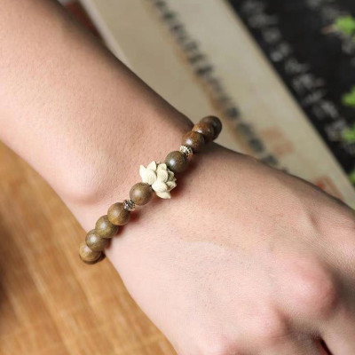 VÒNG TAY GỖ ĐÀN HƯƠNG XANH ĐỔI MÀU VÀ HOA SEN GỖ HOÀNG DƯƠNG