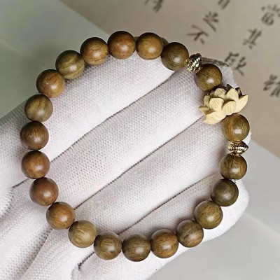 VÒNG TAY GỖ ĐÀN HƯƠNG XANH ĐỔI MÀU VÀ HOA SEN GỖ HOÀNG DƯƠNG