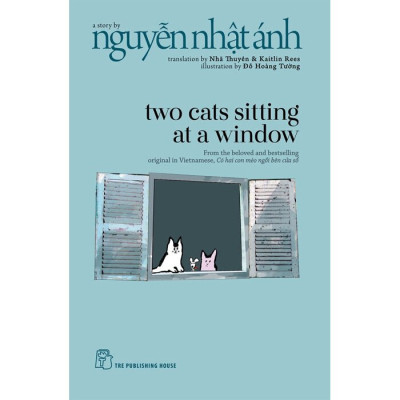 Two Cats Sitting At A Window