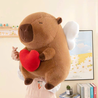 Thú nhồi bông Capybara cánh thiên thần đáng yêu - Size 30cm đến 50cm - Quà tặng gấu bông chuột lang ôm tim cánh trắng êm mịn.