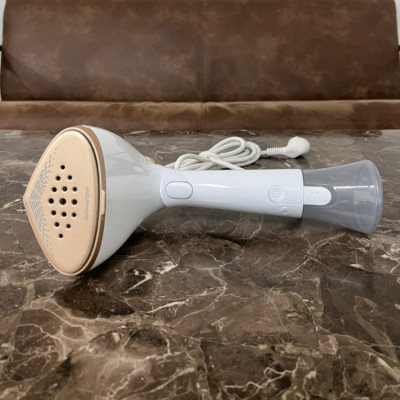 Bàn ủi hơi nước cầm tay 2 trong 1 Philips STH7030/18, công suất 1500W - Hàng Chính Hãng