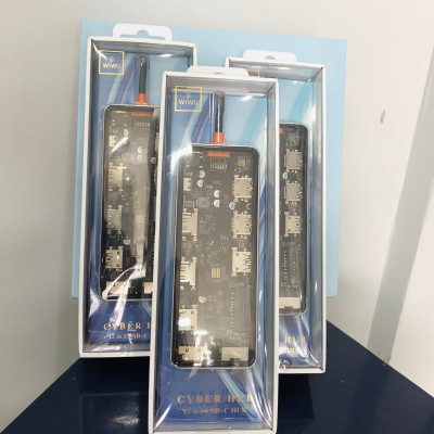 Hub Wiwu Cyber 12in1 USB-C CB012 kết nối nhiều thiết bị hơn với nhiều cổng, chất liệu nhôm và mặt nhựa trong suốt để lộ ra phần vi mạch bên trong- Hàng chính hãng