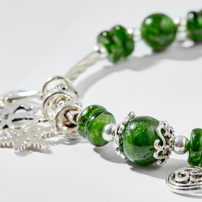 Vòng tay đá Diopside charm cỏ 4 lá Ngọc Quý Gemstones