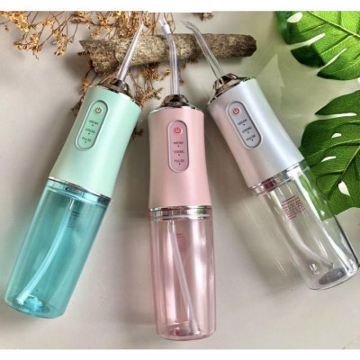 Máy tăm nước vệ sinh răng miệng cực sạch công nghệ Châu Âu - Máy Tăm nước siêu sạch Oral Irrigator kèm 4 đầu phun Nữ Women