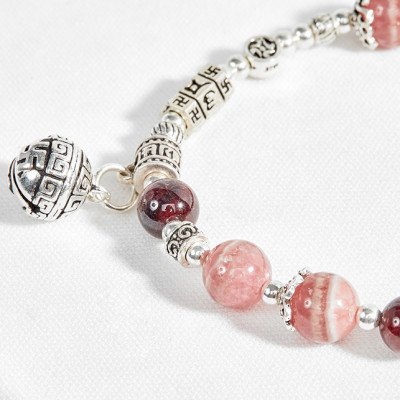 Vòng đá garnet phối đá rhodochrosite và charm chuông bạc Ngọc Quý Gemstones