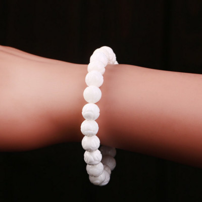 VÒNG TAY ĐÁ TRẮNG KHẮC HOA SEN TÂM BÌNH AN