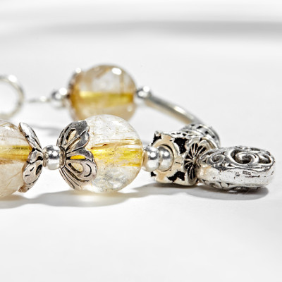 Vòng tay thạch anh tóc vàng phối charm trái tim bạc (10mm) Ngọc Quý Gemstones