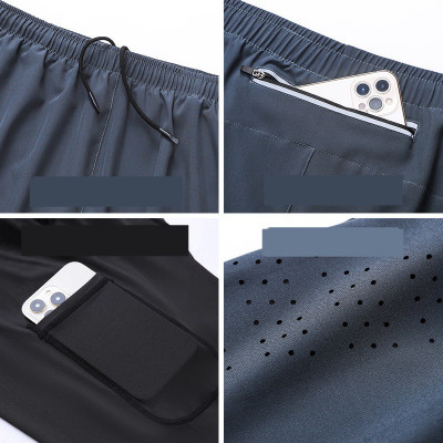 Quần chạy bộ nam Kiotool 2 lớp thoáng khí, thấm hút mồ hôi và khô nhanh, thoải mái vận động